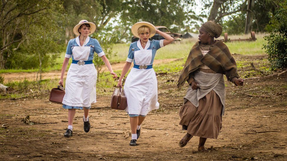 Helen George (centre) with other cast members in Call the Midwife