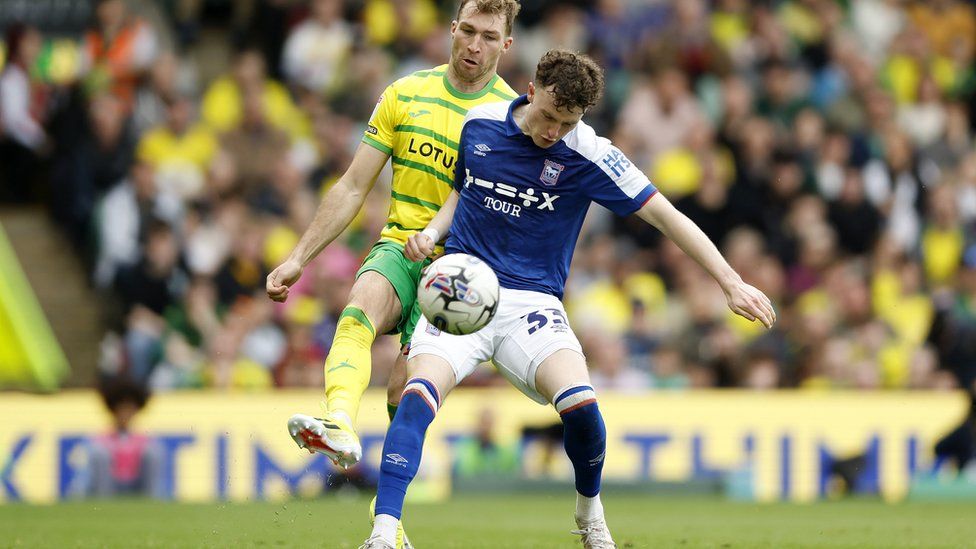 Jack Stacey and Nathan Broadhead in action at Carrow Road