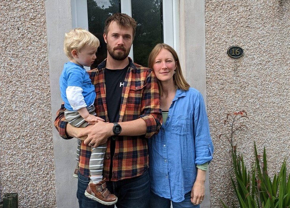Georgie and David Pelly with their son