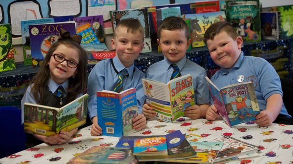 Pupils from St Anthony's Primary in Johnstone - Olivia Regan, Jack McLaughlin, David Baird and Corey Jamieson, which was named Literacy School of the Year by the UKLA in March 2018.