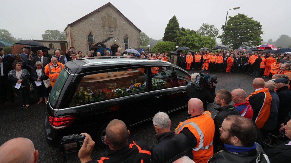 The funeral cortege arrives at Garryduff Presbyterian Church for William Dunlop's funeral