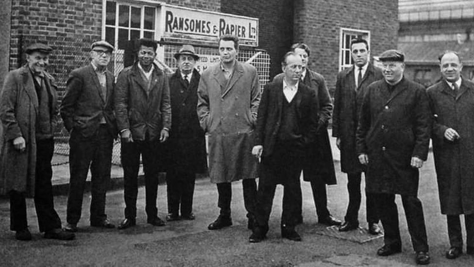 Workers outside Ransome and Rapiers in Ipswich