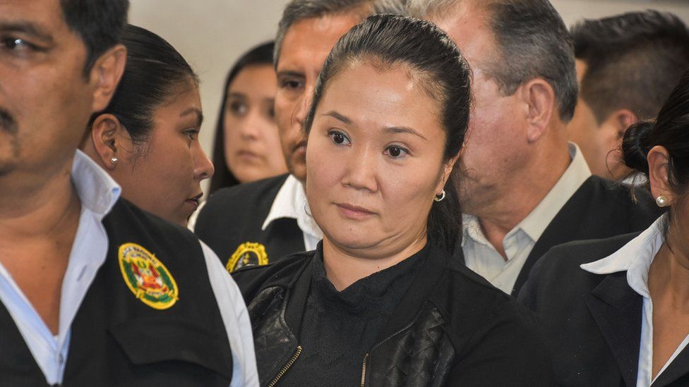 Keiko Fujimori (C) is detained