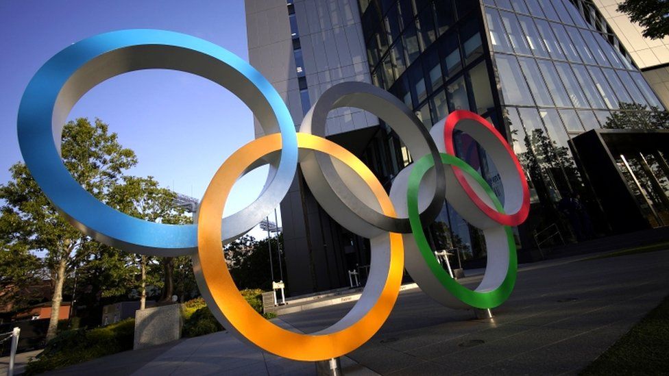 Olympic Rings monument outside a stadium