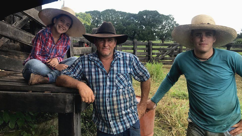 Carina and Rodrigo and their father Gerson are farmers