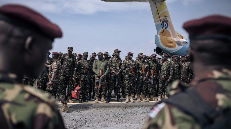 Kenyan soldiers from the East African Community regional force (EAC-RF) prepare to leave the Democratic Republic of Congo, at Goma airport, on December 3, 2023.