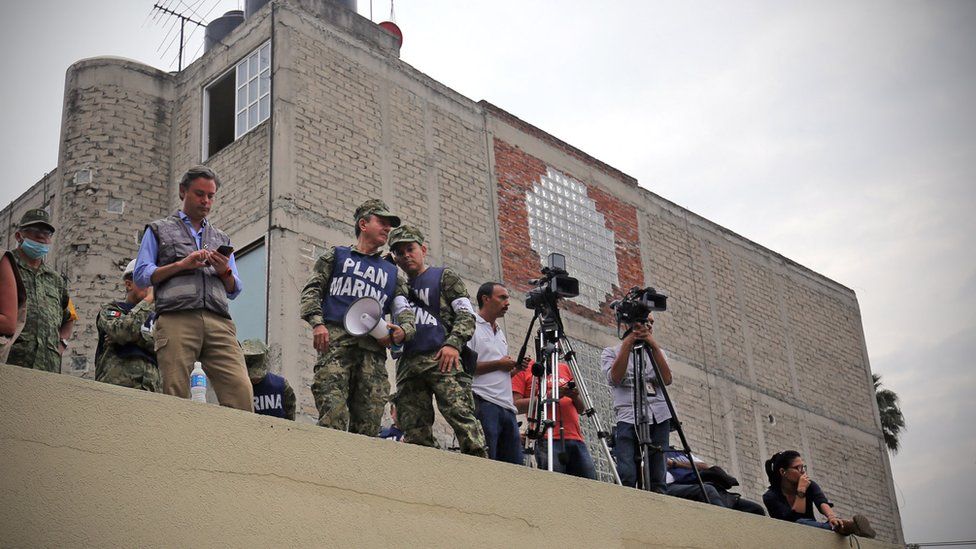 Mexico’s Secretary of Public Education (grey vest), oversees the rescue efforts at the Enrique Rébsamen primary school, Mexico City, 20 September 2017