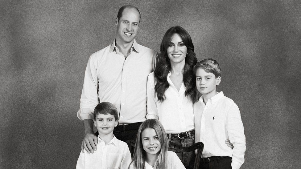 The Prince and Princess of Wales pose for their annual Christmas card picture, alongside their three children, George (R), Charlotte and Louis (L)
