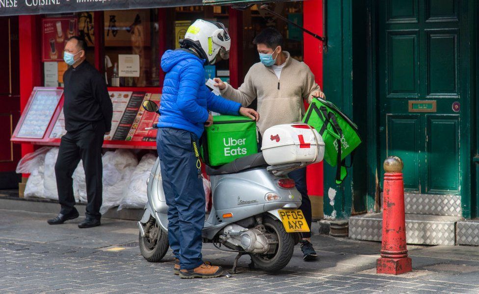 An Uber Eats delivery man in London