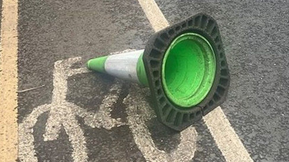 Traffic cones knocked over on cycle lanes on the A56