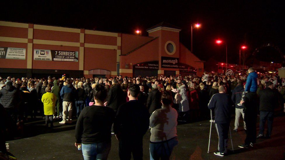 People gather at vigil