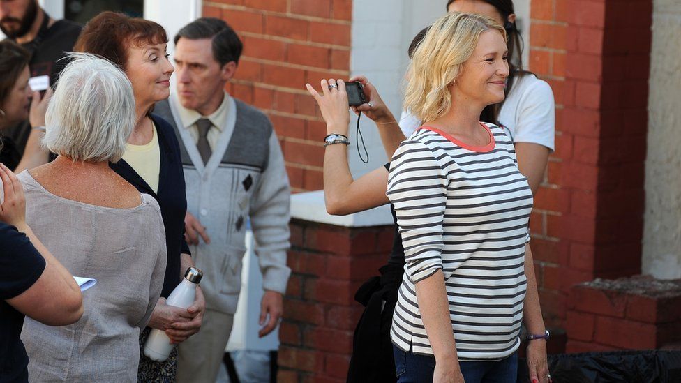Melanie Waters and Joanna Page pose for pictures as Rob Brydon looks on