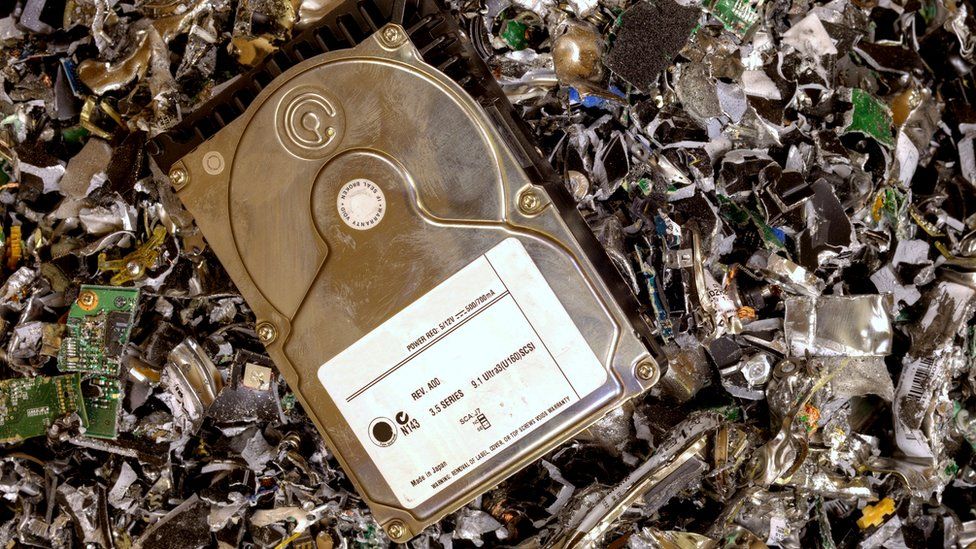 Hard drive on shredded metal