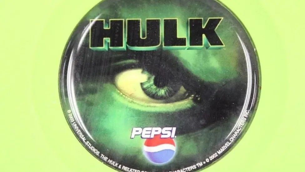 The Hulk branding on the Xbox, including a close-up of The Hulk's green eye from the movie poster, and a Pepsi logo