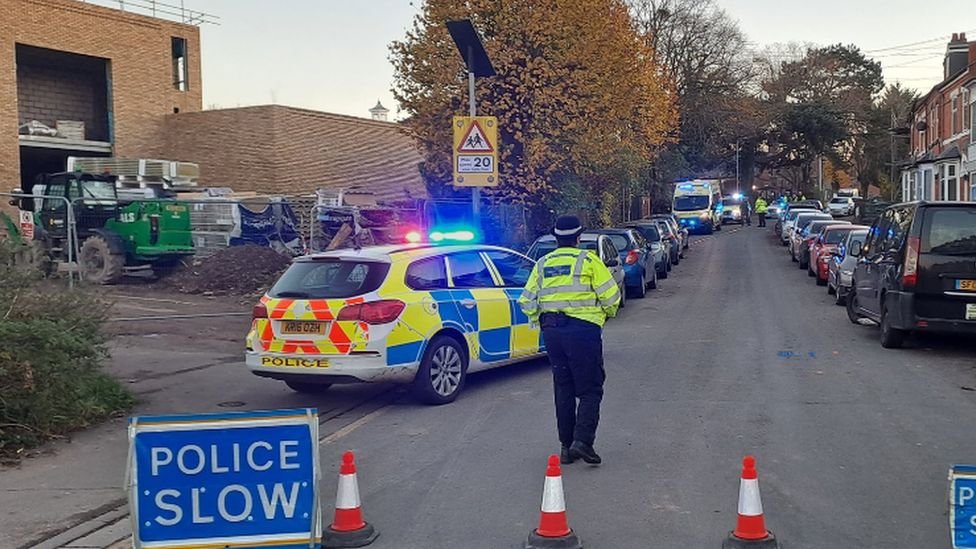 Police outside the school when the boy was struck