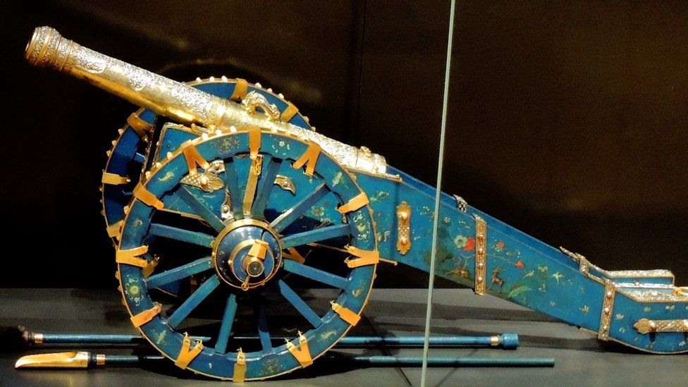 Bronze gem encrusted cannon