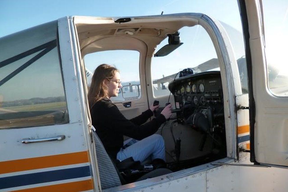 Natasha Abrahart sitting in a small plane