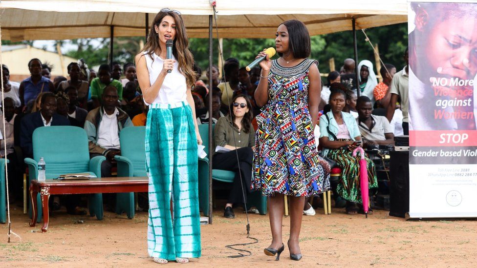Amal Clooney and human rights lawyer Chikondi Chijozi at the mobile legal clinic in Mchinji district