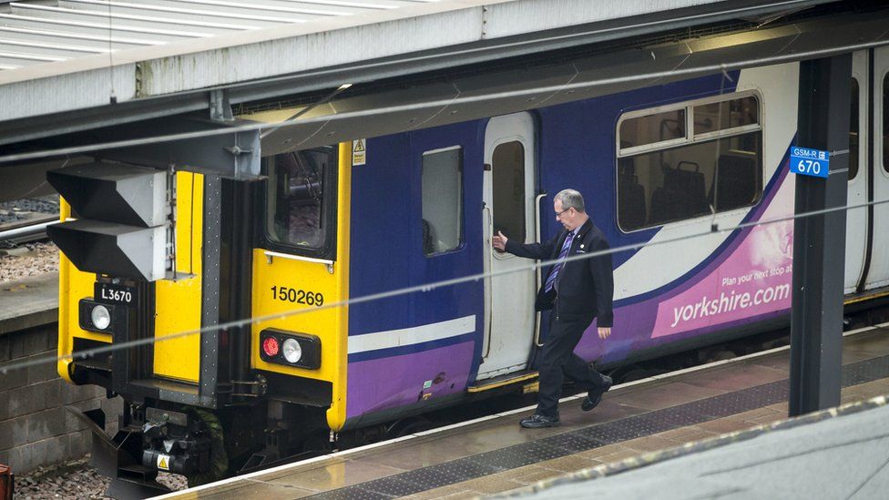 guard outside train