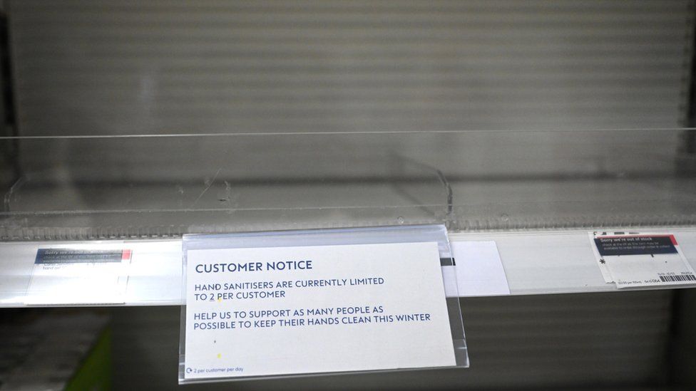 A sign for hand sanitisers is displayed on an empty shelf in a pharmacy in London, Britain, 05 March 2020