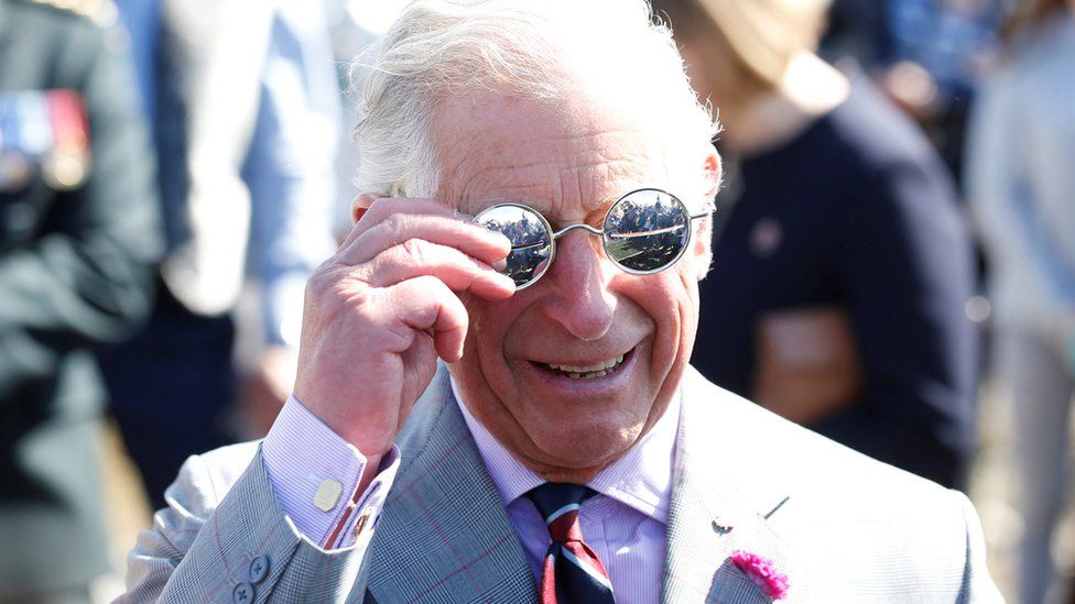 Prince Charles wearing the silver snow goggles