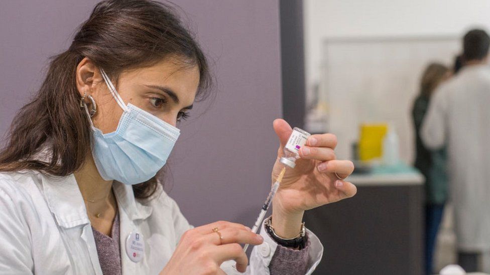 Italian doctor using AstraZeneca vaccine in Bologna, 19 Mar 21
