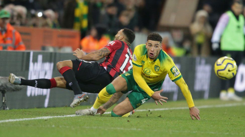 Ben Godfrey of Norwich City is sent off following this tackle on Callum Wilson of Bournemouth