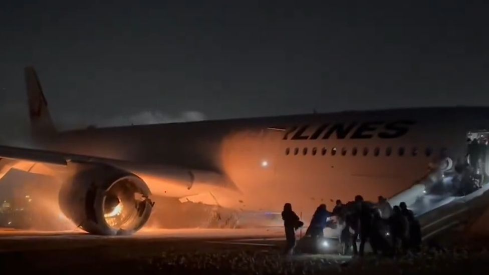 Passengers flee burning plane