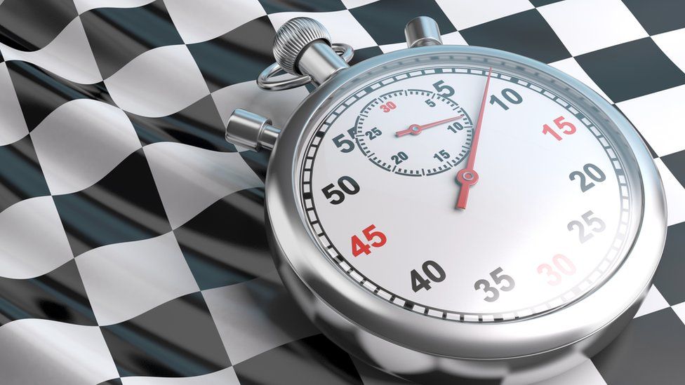 Stopwatch and chequered flag