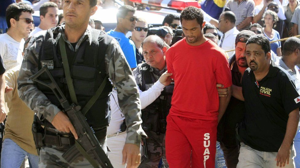 Bruno Fernandes being escorted by police in 2010