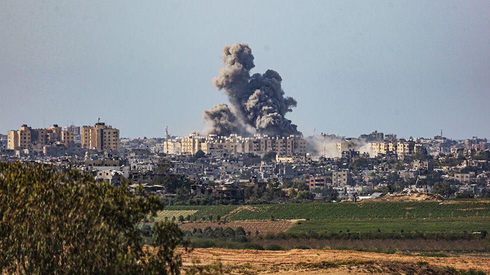 Smoke rises above Beit Hanoun after an Israeli aerial attack on the area - 21 October 2023