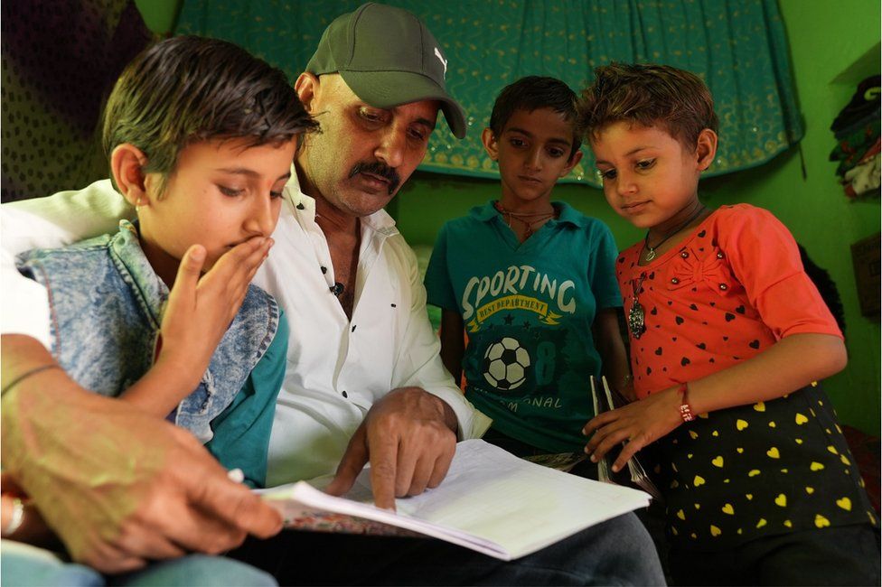 Chaudhary teaches English to his nephews at home