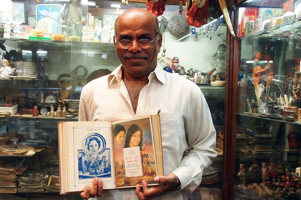 Shahid Husain Mansoori with the only existing song booklet of Alam Ara (1931)