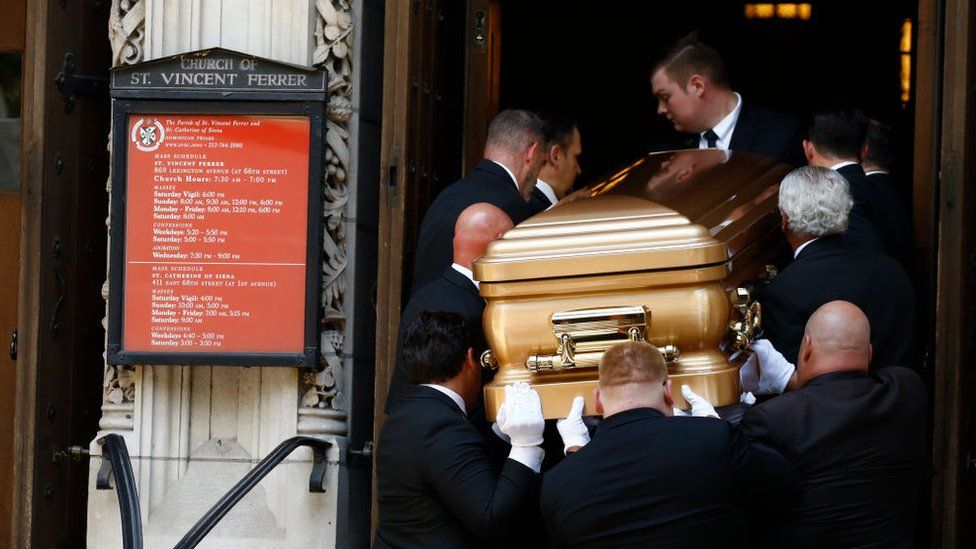 Pallbearers carry the casket at the funeral of Ivana Trump