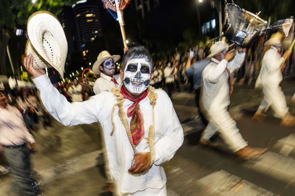 Participants in the annual Catrinas Parade ahead of Day of the Dead in Mexico City, Mexico on 22 October, 2023