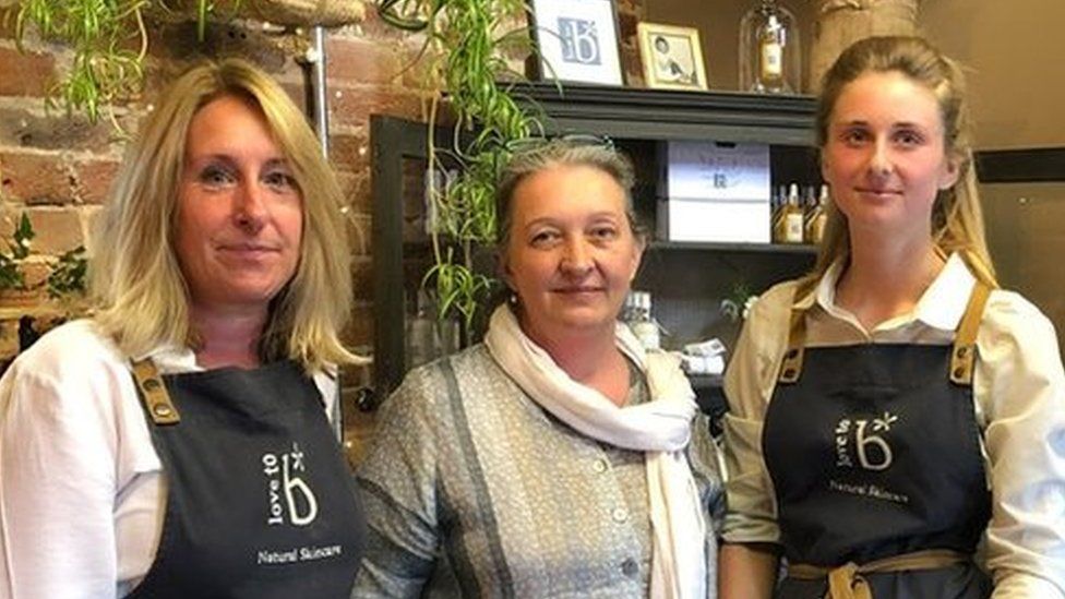 Julie Astley-Weston (centre) with two female members of staff inside Love to B skincare shop