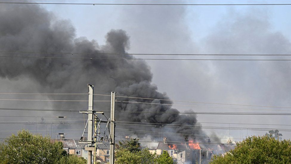 Smoke billows above buildings in Rainham, east London