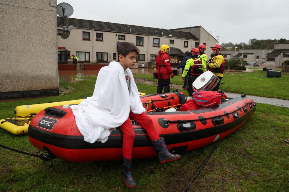 Boy evacuated after flood