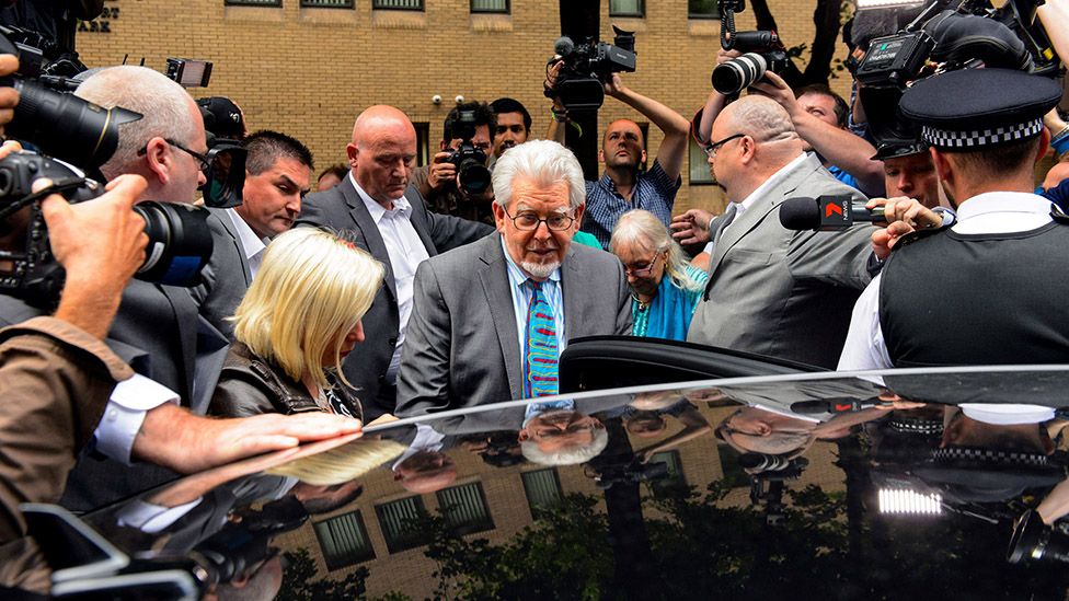 Rolf Harris leaves Southwark Crown Court after being found guilty