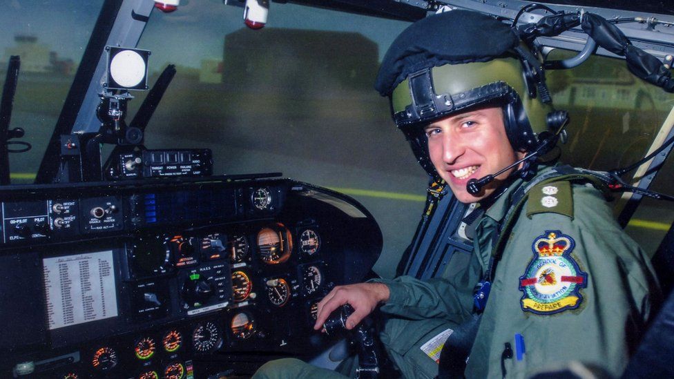 A younger Prince William in a cockpit