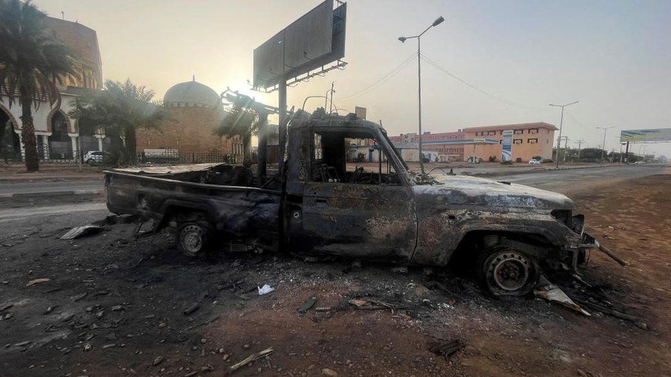 A burned vehicle is seen in Khartoum, Sudan April 26, 2023