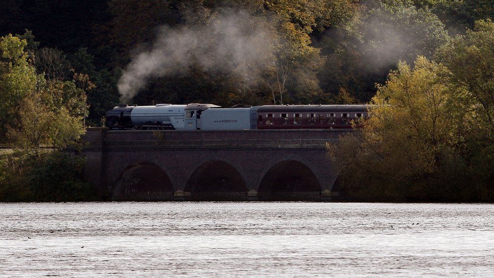 The Tornado steams its way across Swithland Reservoir, in Leicestershire, on the UK's only main line heritage railway