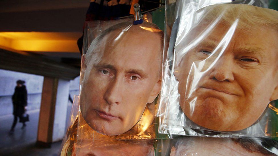 Face masks depicting Russian President Vladimir Putin and US President-elect Donald Trump at a souvenir street shop in St Petersburg, Russia, Friday, Dec 23, 2016