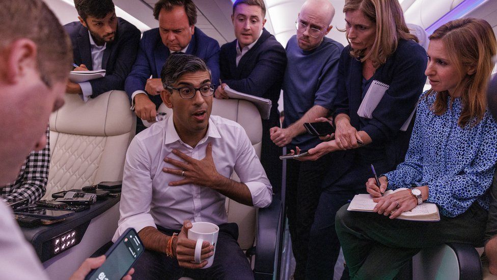 Rishi Sunak on plane with reporters