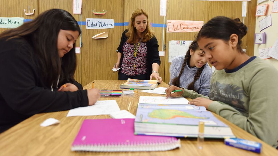 Instructor Blanca Claudio (C) teaches a history lesson in Spanish in a Dual Language Academy class at Franklin High School in Los Angeles, California, on May 25, 2017.