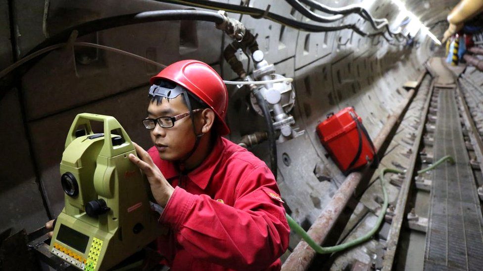 Labours work at a construction site of the Chinese section of the China-Russia East Route natural gas pipeline on September 20, 2017 in Heihe, China.