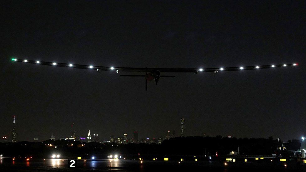The Solar Impulse 2 aircraft flies out from New York
