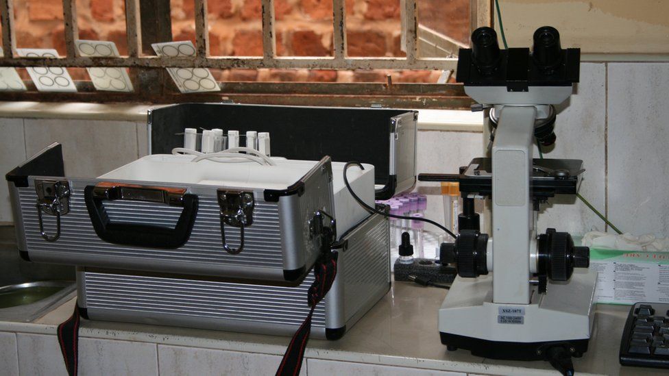 The Matibabu device next to a microscope