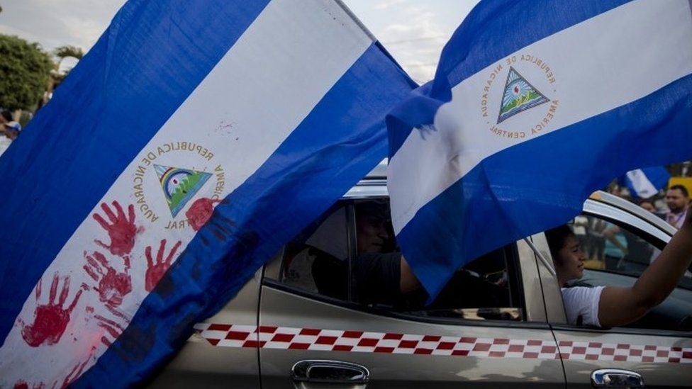 A motorist participates in a protest against the government of nicaraguan President Daniel Ortega, in the municipality of Niquinohomo, Nicaragua, 05 May