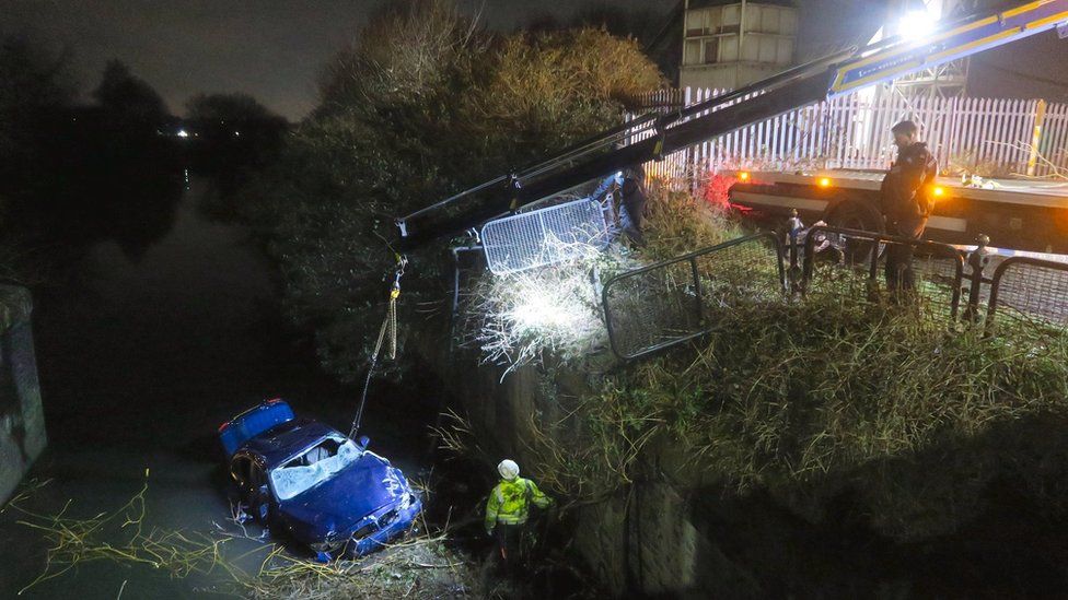 Car being recovered from the canal
